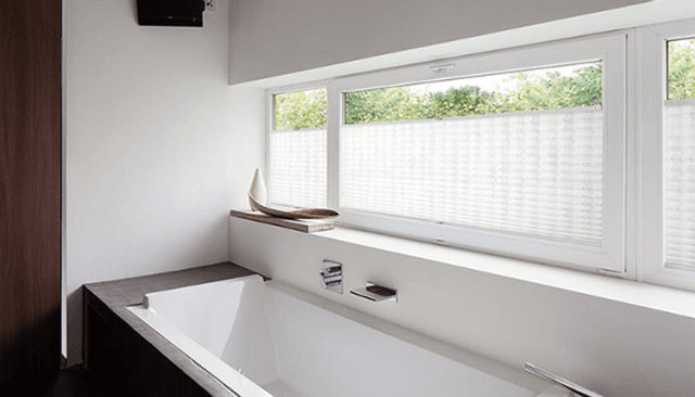 Custom Roman shades in a classic New York City interior