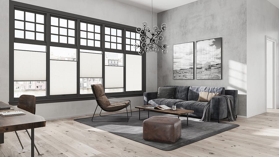 Custom European shades installed on large modern windows in a design-led home